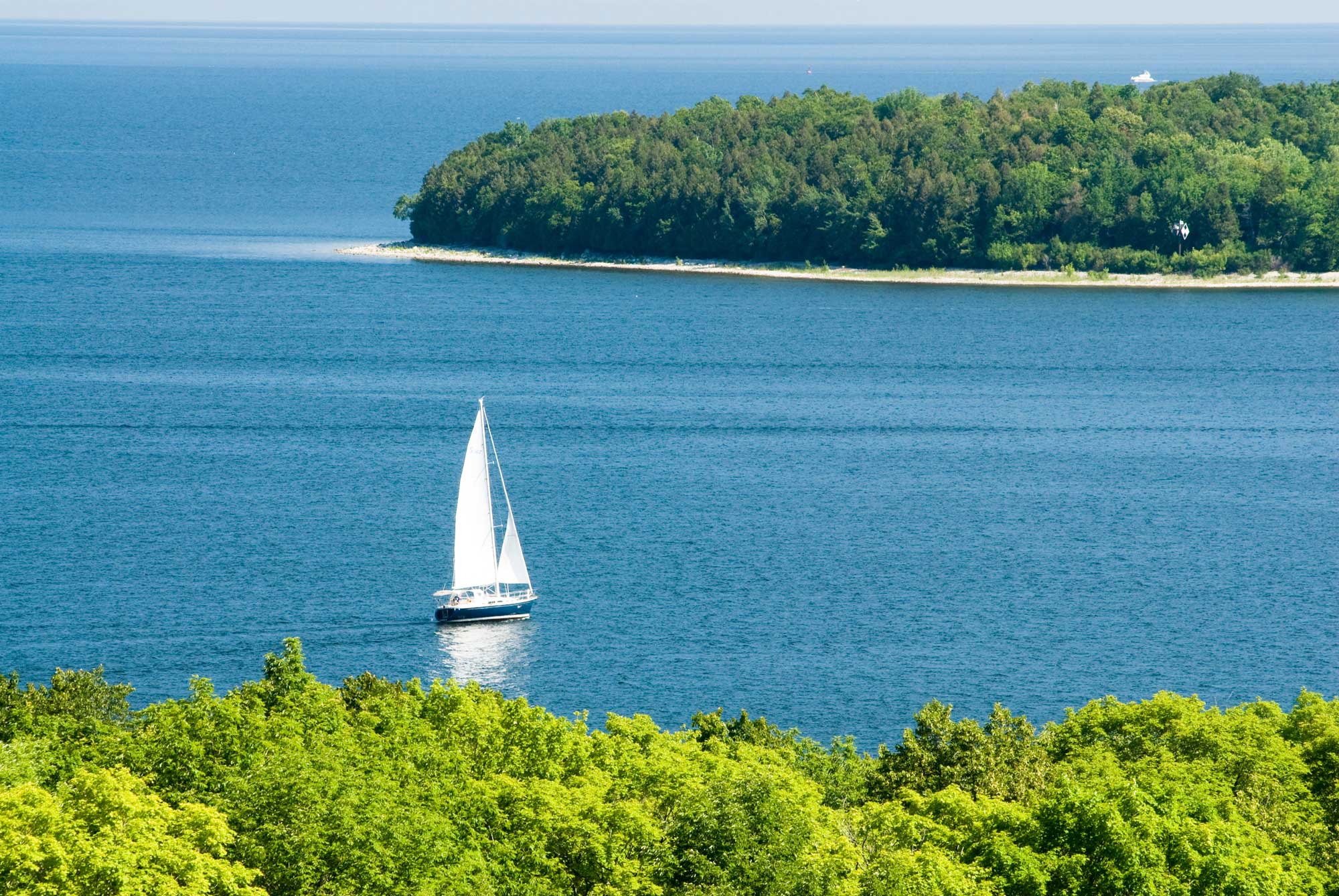 a lone sailboat